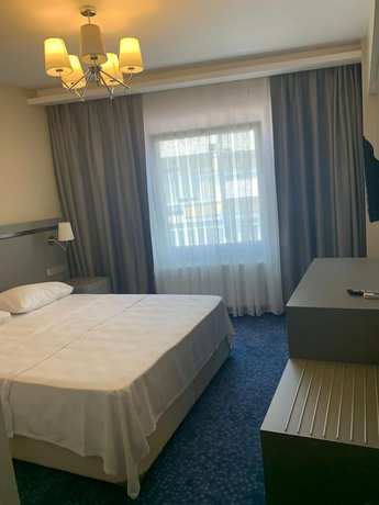 Imagen de la habitación del Acar Suite Hotel. Foto 12