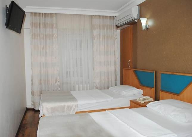 Imagen de la habitación del Acelya Hotel. Foto 11