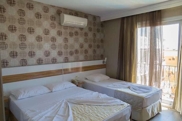 Imagen de la habitación del Acem Hotel, Ayvalik. Foto 8