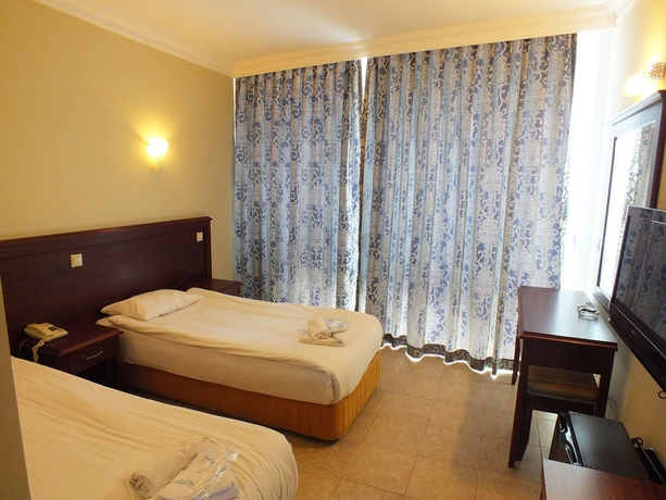 Imagen de la habitación del Acropol Beach Hotel. Foto 11