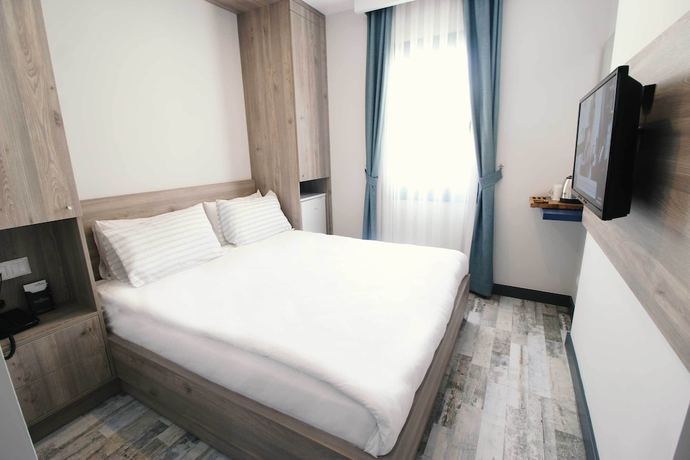 Imagen de la habitación del Acropol Of Bodrum Beach Hotel. Foto 2