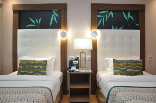 Imagen de la habitación del Acuatico Beach Resort & Hotel Inc.. Foto 12