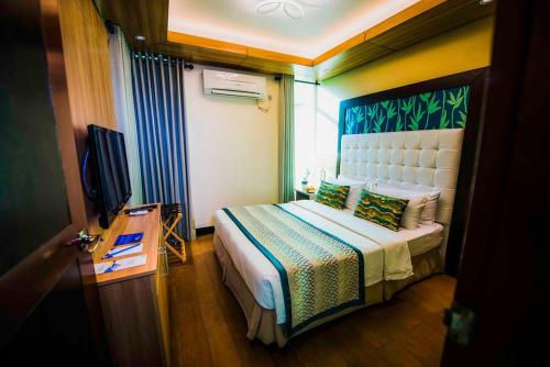 Imagen de la habitación del Acuatico Beach Resort & Hotel Inc.. Foto 16