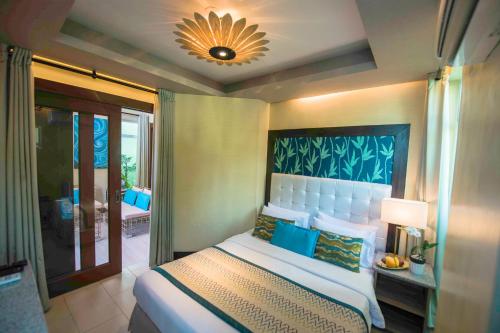 Imagen de la habitación del Acuatico Beach Resort & Hotel Inc.. Foto 17