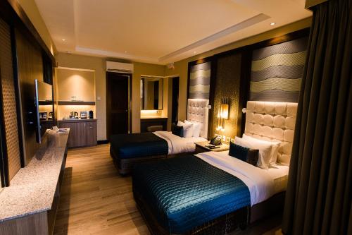 Imagen de la habitación del Acuatico Beach Resort & Hotel Inc.. Foto 19