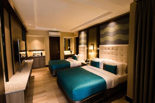 Imagen de la habitación del Acuatico Beach Resort & Hotel Inc.. Foto 20