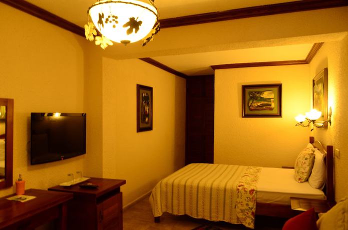 Imagen de la habitación del Ada Bacchus Hotel. Foto 16