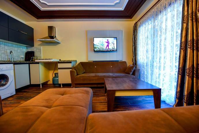 Imagen de la habitación del Ada Bungalow Hotel. Foto 4