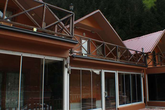Imagen de la habitación del Ada Bungalow Hotel. Foto 10