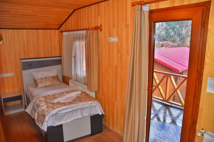 Imagen de la habitación del Ada Bungalow Hotel. Foto 12