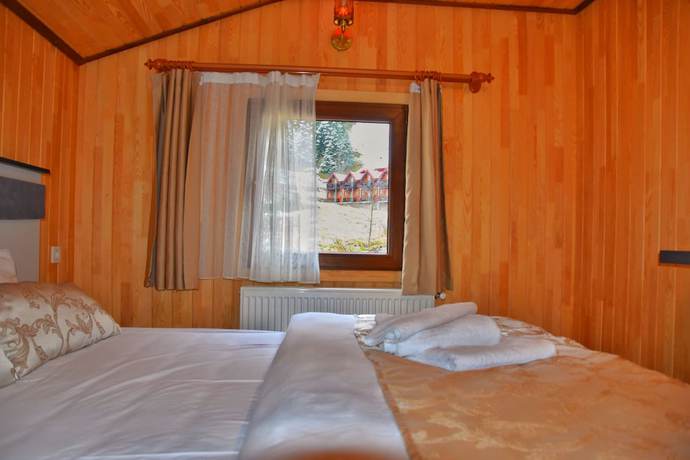 Imagen de la habitación del Ada Bungalow Hotel. Foto 15