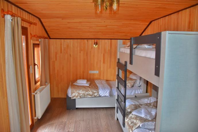 Imagen de la habitación del Ada Bungalow Hotel. Foto 18