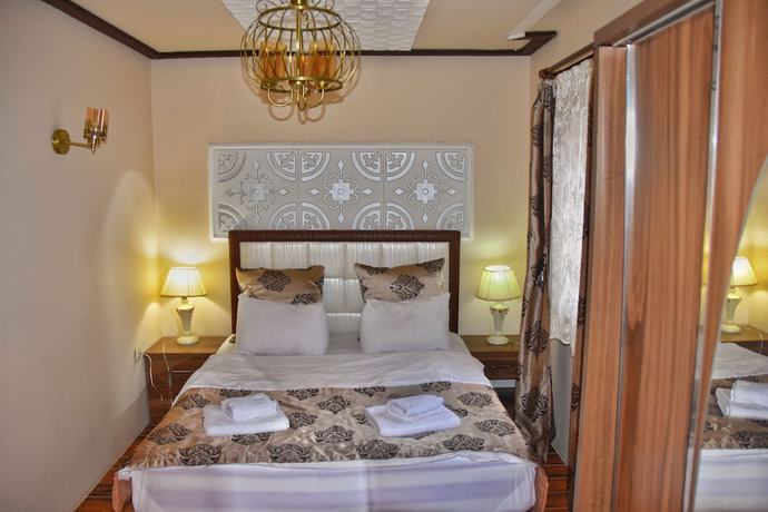 Imagen de la habitación del Ada Bungalow Hotel. Foto 19