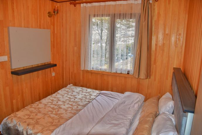 Imagen de la habitación del Ada Bungalow Hotel. Foto 20