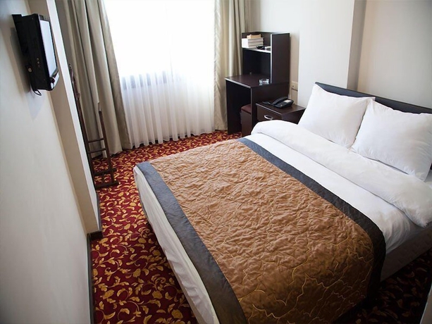 Imagen de la habitación del Adana Omur Otel. Foto 10