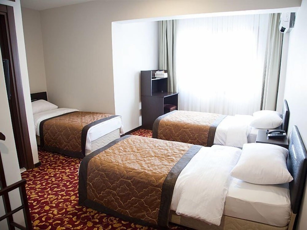 Imagen de la habitación del Adana Omur Otel. Foto 12