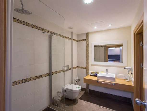 Imagen de la habitación del Address Residence Suite Hotel. Foto 15