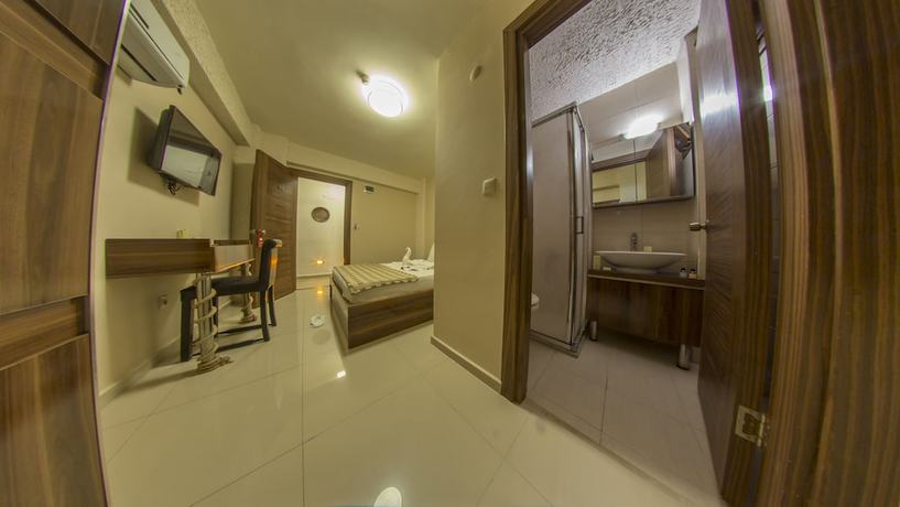 Imagen de la habitación del Ados Hotel. Foto 11