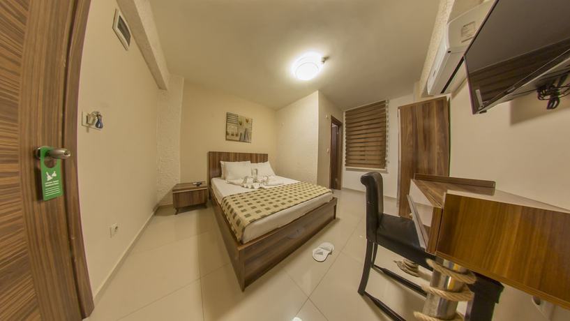 Imagen de la habitación del Ados Hotel. Foto 15
