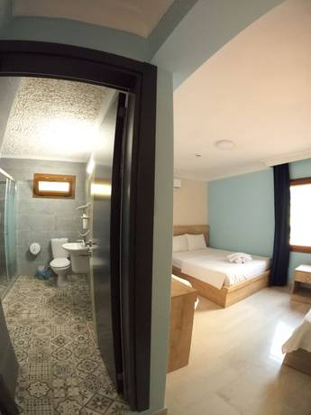 Imagen de la habitación del Ados Hotel. Foto 16