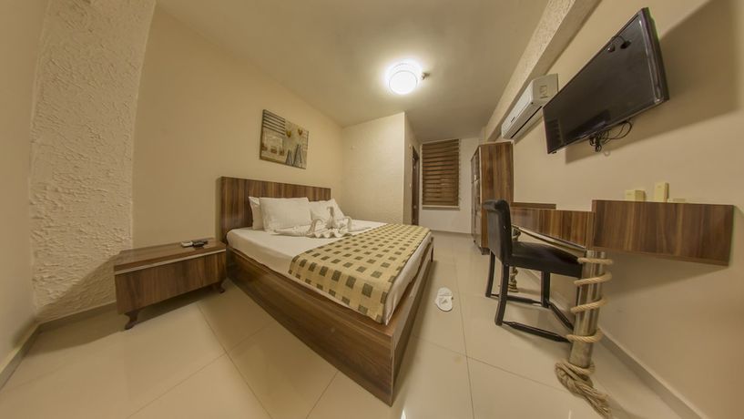 Imagen de la habitación del Ados Hotel. Foto 18