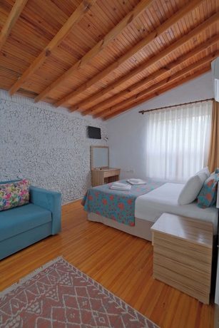 Imagen de la habitación del Adrasan Hotel. Foto 9