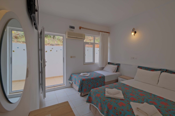 Imagen de la habitación del Adrasan Hotel. Foto 13