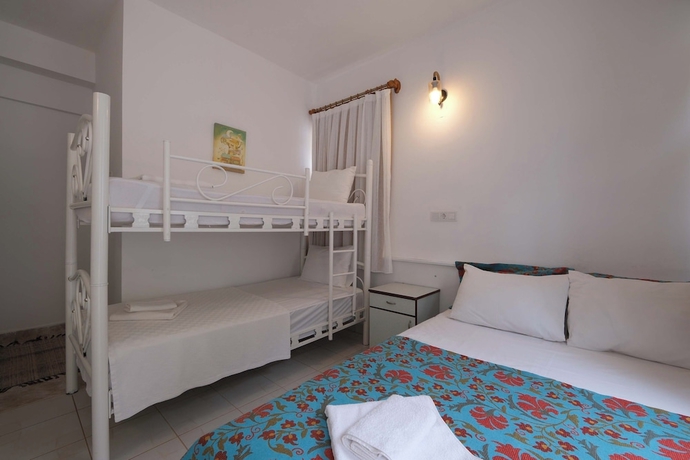 Imagen de la habitación del Adrasan Hotel. Foto 15