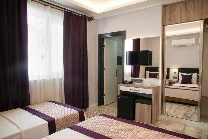 Imagen de la habitación del Af-Ra Hotel. Foto 10