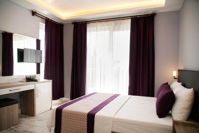 Imagen de la habitación del Af-Ra Hotel. Foto 15