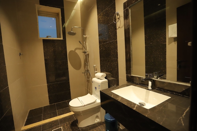 Imagen de la habitación del Afal Suites Al Yarmouk. Foto 11