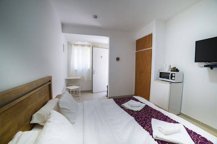 Imagen de la habitación del Agamim Hotel. Foto 8