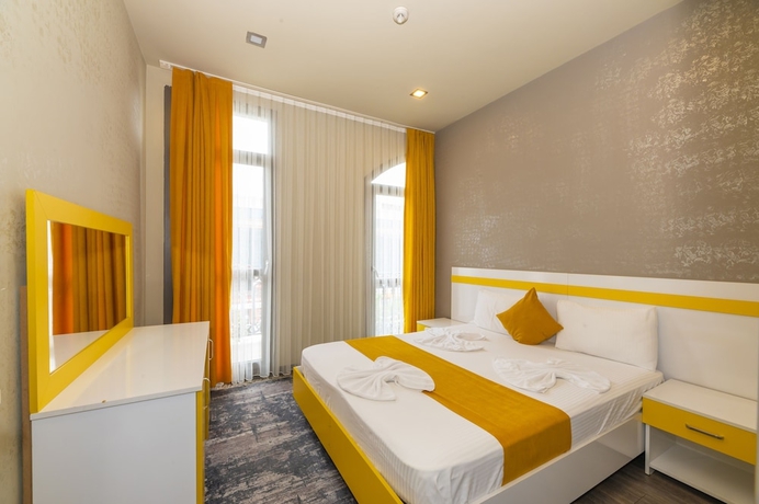 Imagen de la habitación del Agora Suites. Foto 10