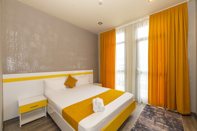 Imagen de la habitación del Agora Suites. Foto 11