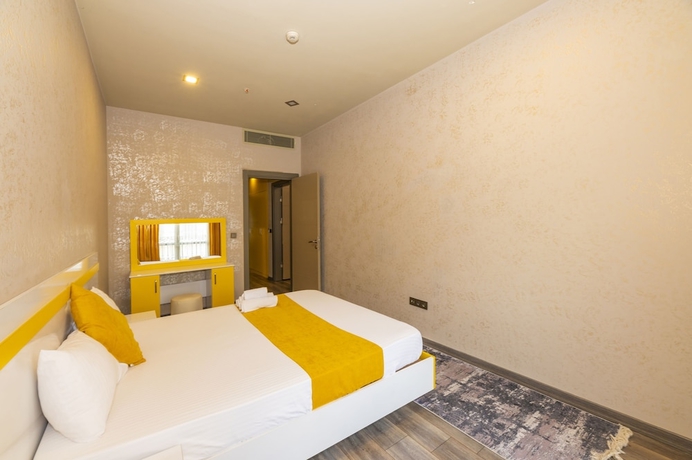 Imagen de la habitación del Agora Suites. Foto 12