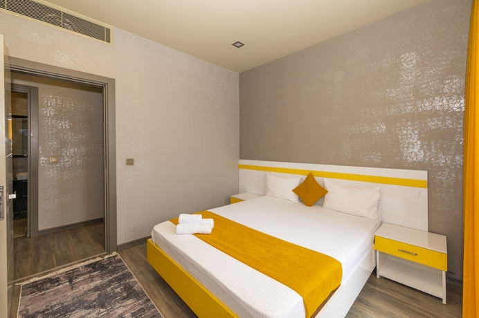 Imagen de la habitación del Agora Suites. Foto 17