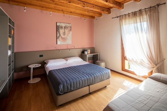 Imagen de la habitación del Agriturismo Ai Due Leoni. Foto 17