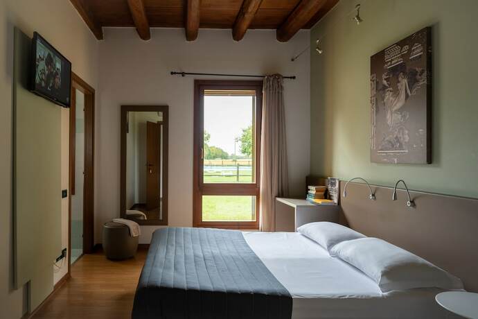 Imagen de la habitación del Agriturismo Ai Due Leoni. Foto 18