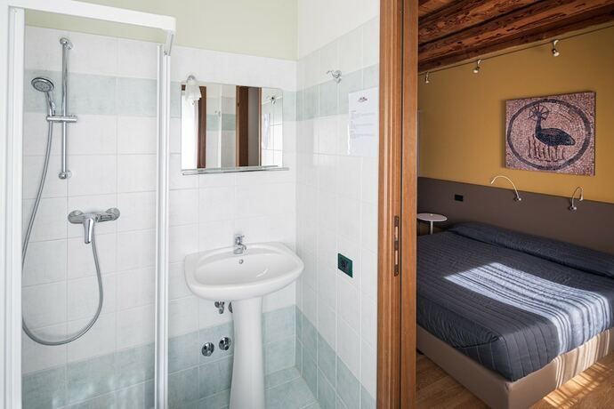 Imagen de la habitación del Agriturismo Ai Due Leoni. Foto 19