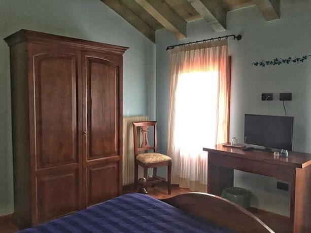 Imagen de la habitación del Agriturismo Borgo Tecla. Foto 13
