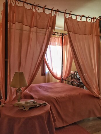 Imagen de la habitación del Agriturismo Borgo Tecla. Foto 15