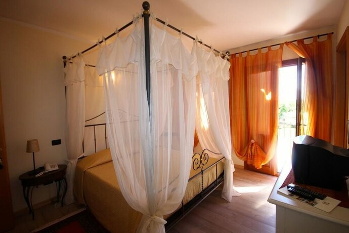 Imagen de la habitación del Agriturismo Borgo Tecla. Foto 18