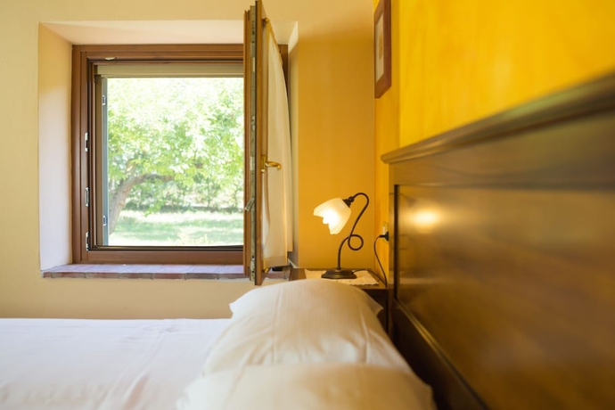 Imagen de la habitación del Agriturismo Casa Rosa. Foto 9