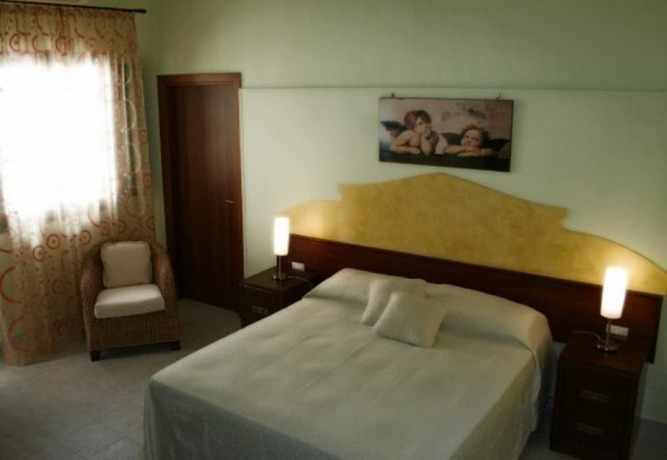 Imagen de la habitación del Agriturismo Casale San Giovanni. Foto 18