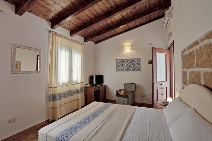 Imagen de la habitación del Agriturismo Casale degli Ulivi. Foto 6