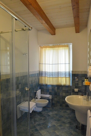 Imagen de la habitación del Agriturismo Casale degli Ulivi. Foto 11