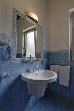 Imagen de la habitación del Agriturismo Casale degli Ulivi. Foto 14