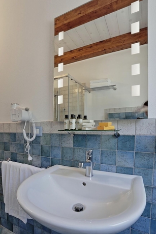 Imagen de la habitación del Agriturismo Casale degli Ulivi. Foto 15