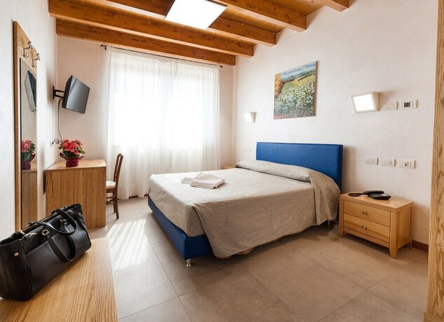 Imagen de la habitación del Agriturismo Corte Tonolli. Foto 12
