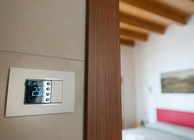 Imagen de la habitación del Agriturismo Corte Tonolli. Foto 13